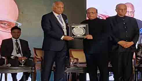Dr. Raju Vaishya receiving award from Dr. Prathap C. Reddy 
