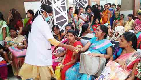 Cap: Nurse giving bananas at Modern Govt. Maternity Hospital, Hyderabad.
