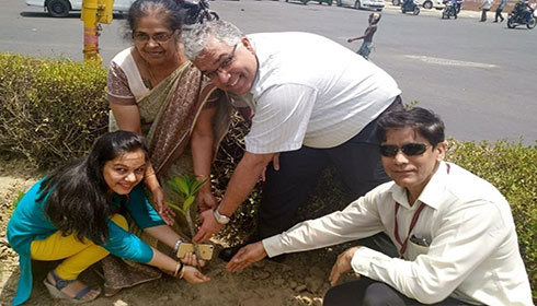 Dr Sanjay Mehta planting a saplling in the hospital