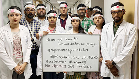 AIIMS Delhi, doctors  wearing head bandages with fake blood  in support of doctors on strike in West Bengal